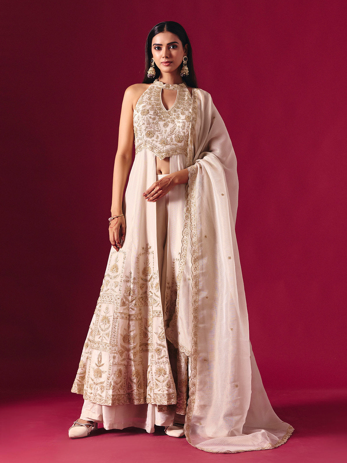Off white silk embroidered halter neck festive palazzo suit with dupatta