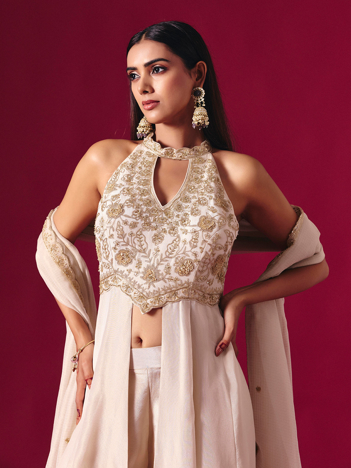 Off white silk embroidered halter neck festive palazzo suit with dupatta