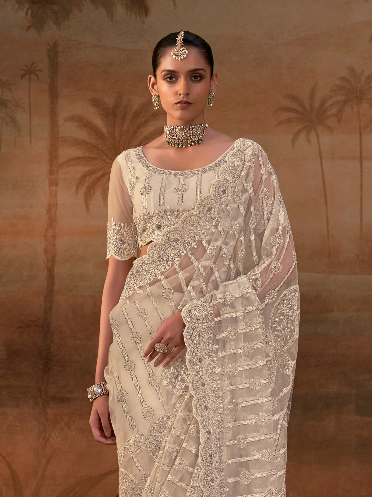 Beige net womens embellished saree with unstitched blouse