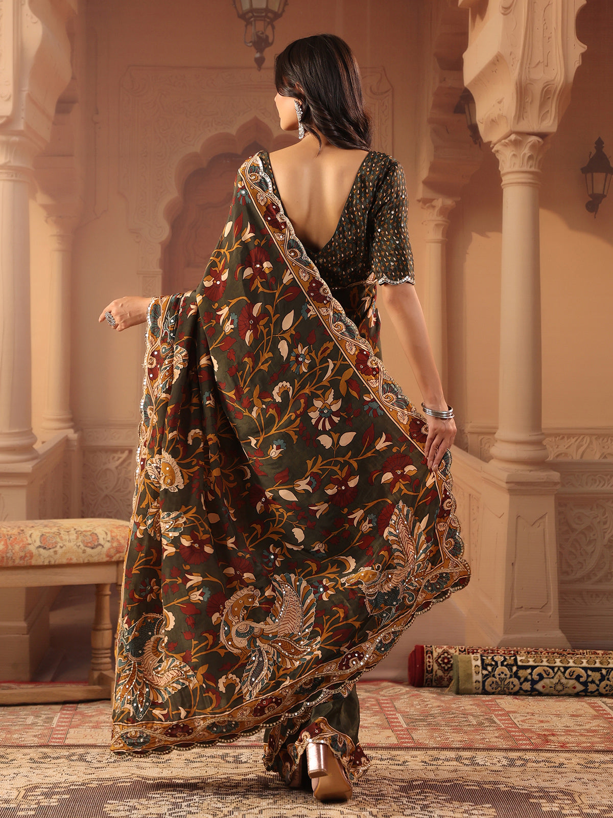 Deep olive green peacock kalamkari saree