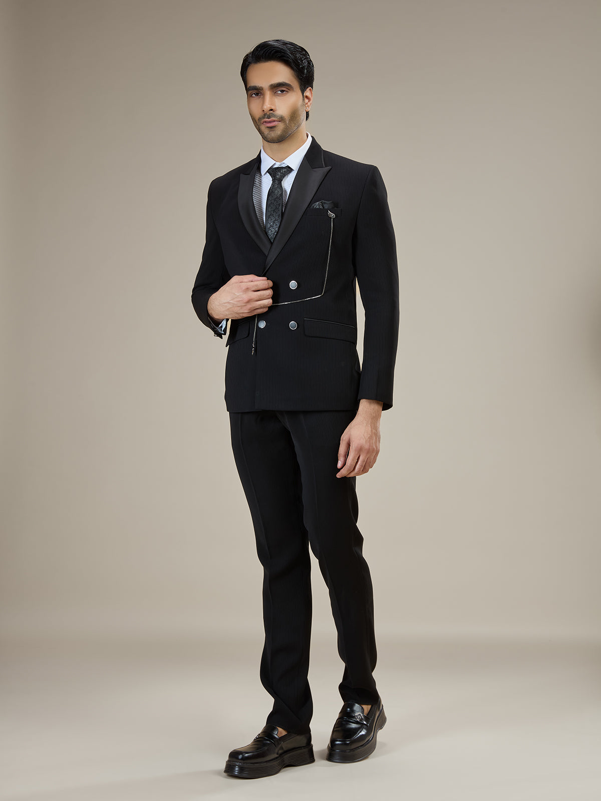 Black textured double breasted coat suit with chain detail