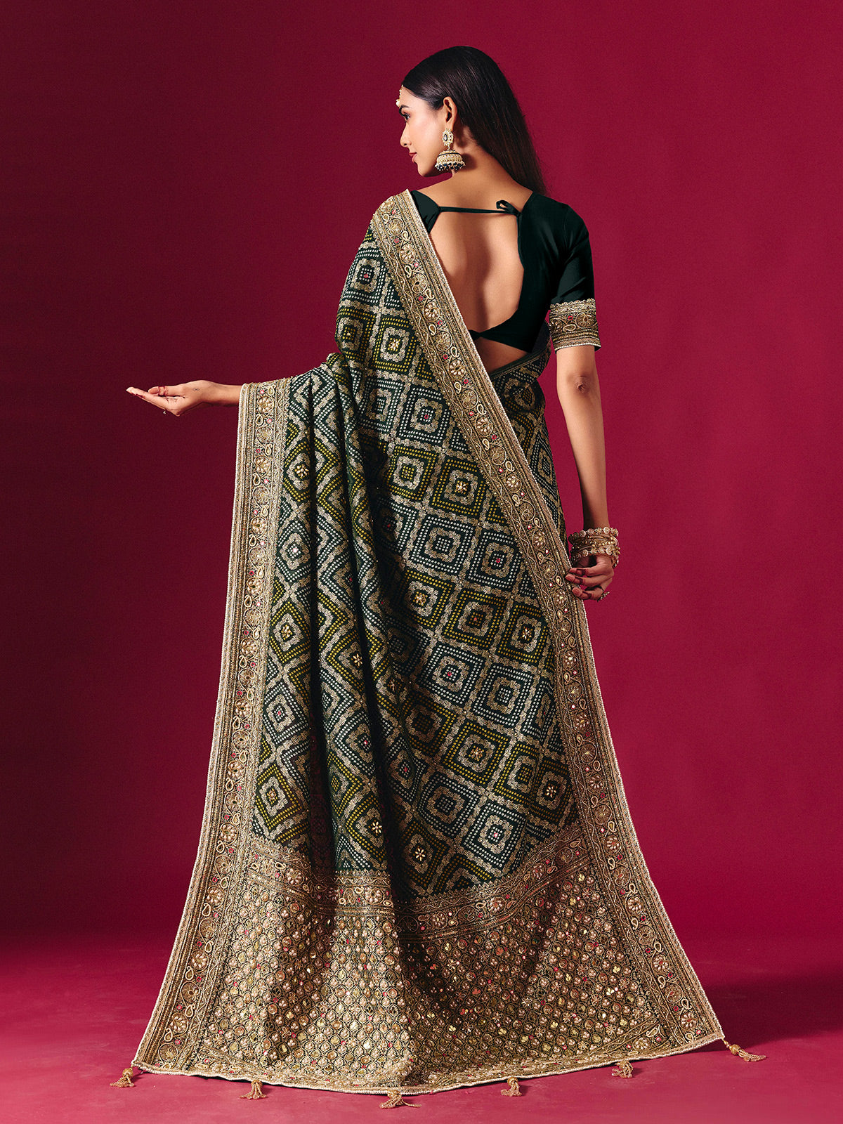 Green georgette saree with festive embellishments