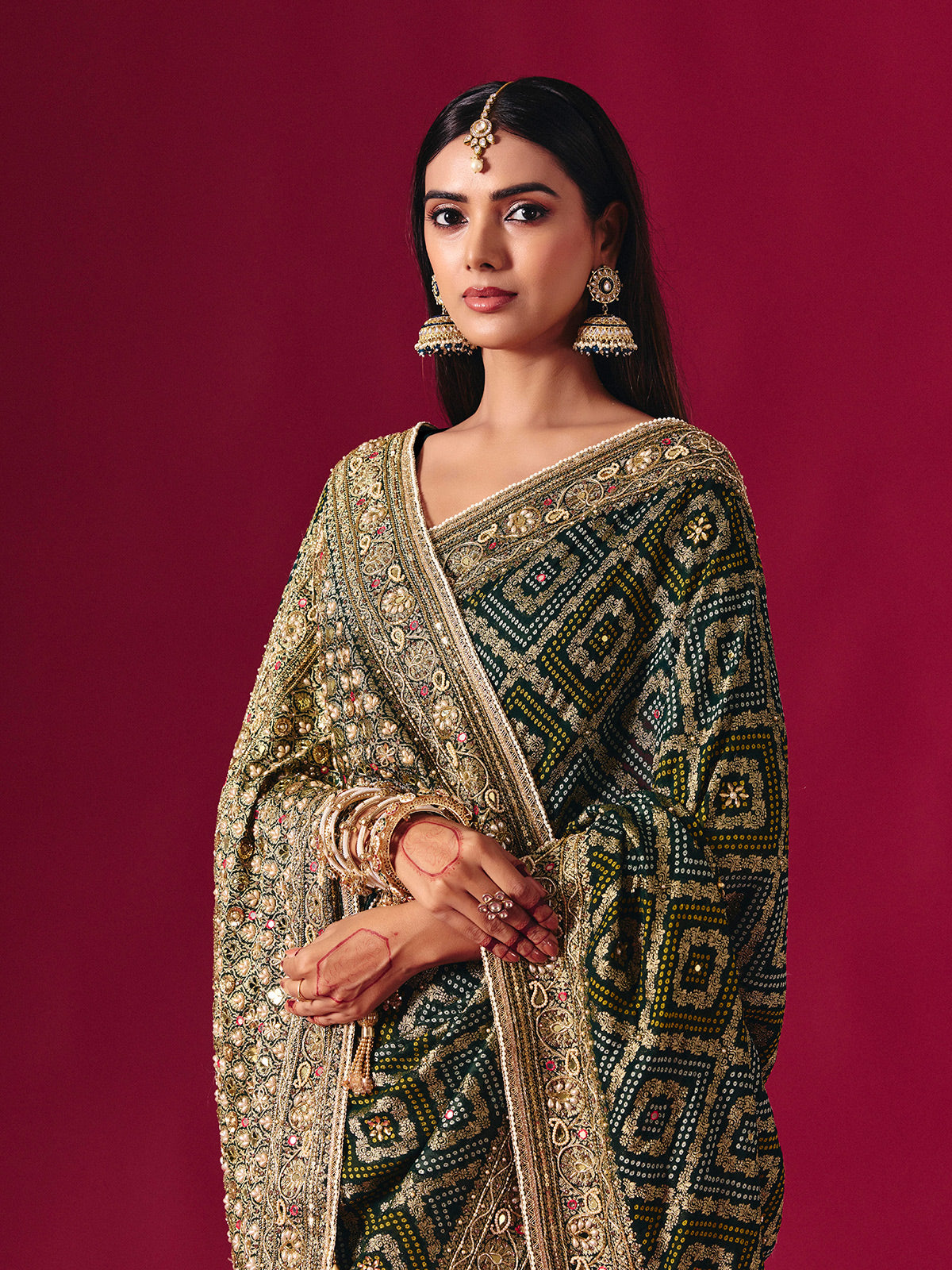 Green georgette saree with festive embellishments
