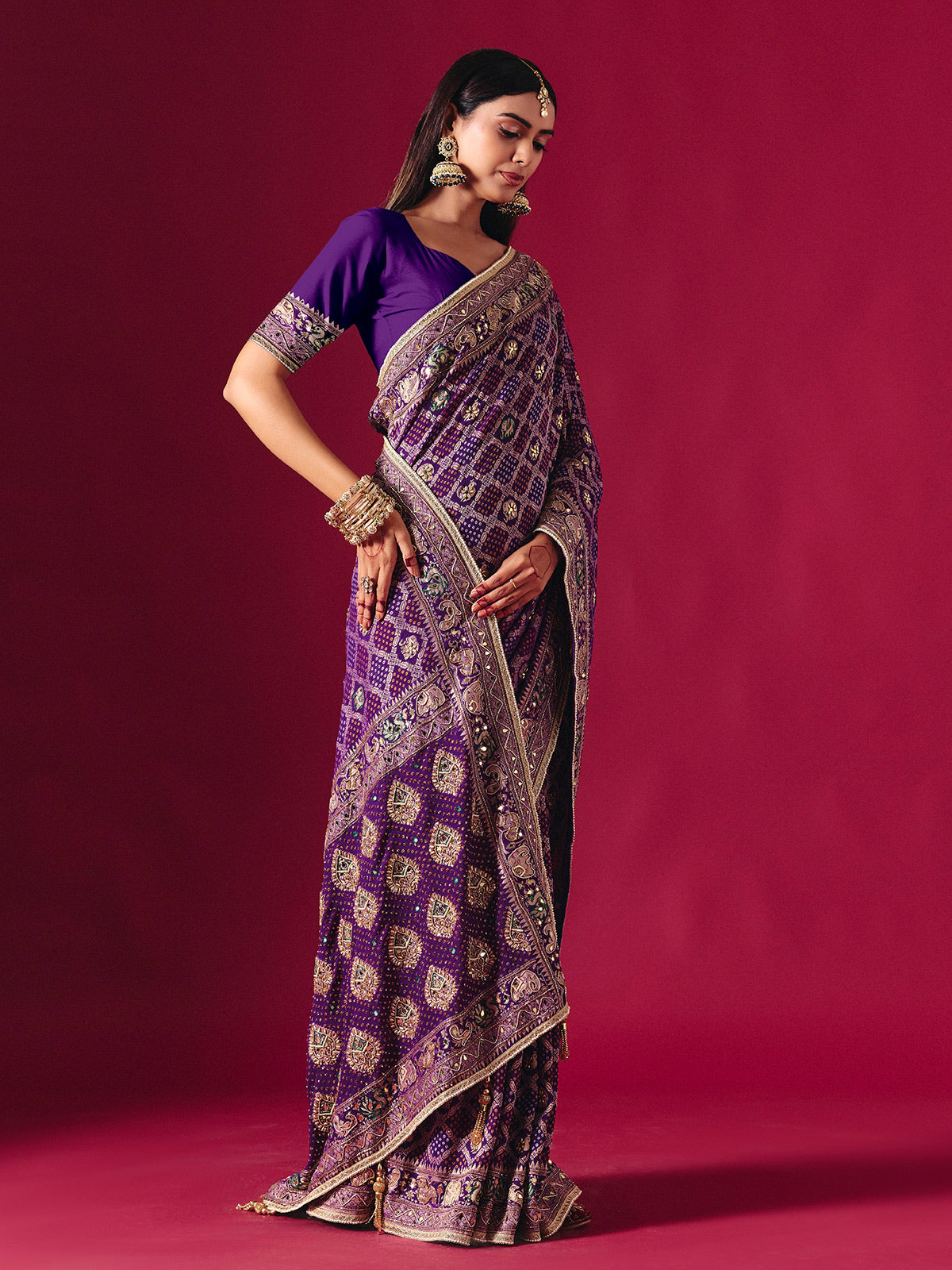 Purple georgette saree with elegant bandhani artistry