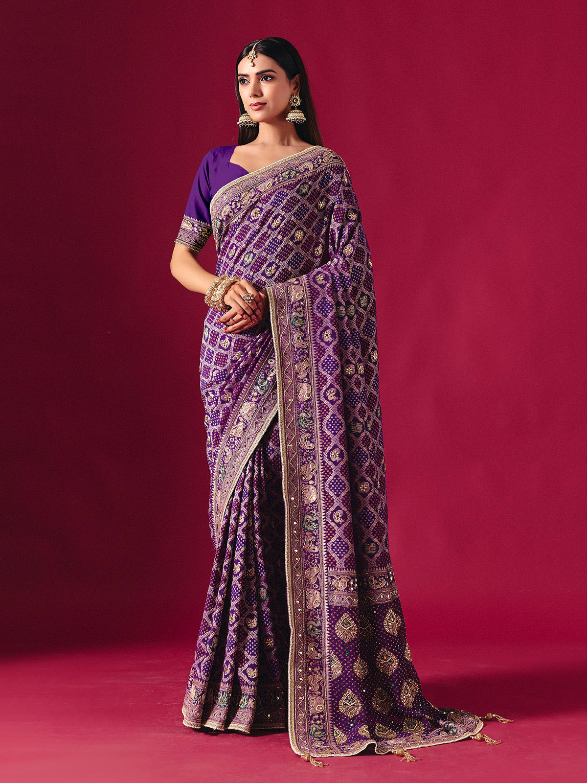 Purple georgette saree with elegant bandhani artistry