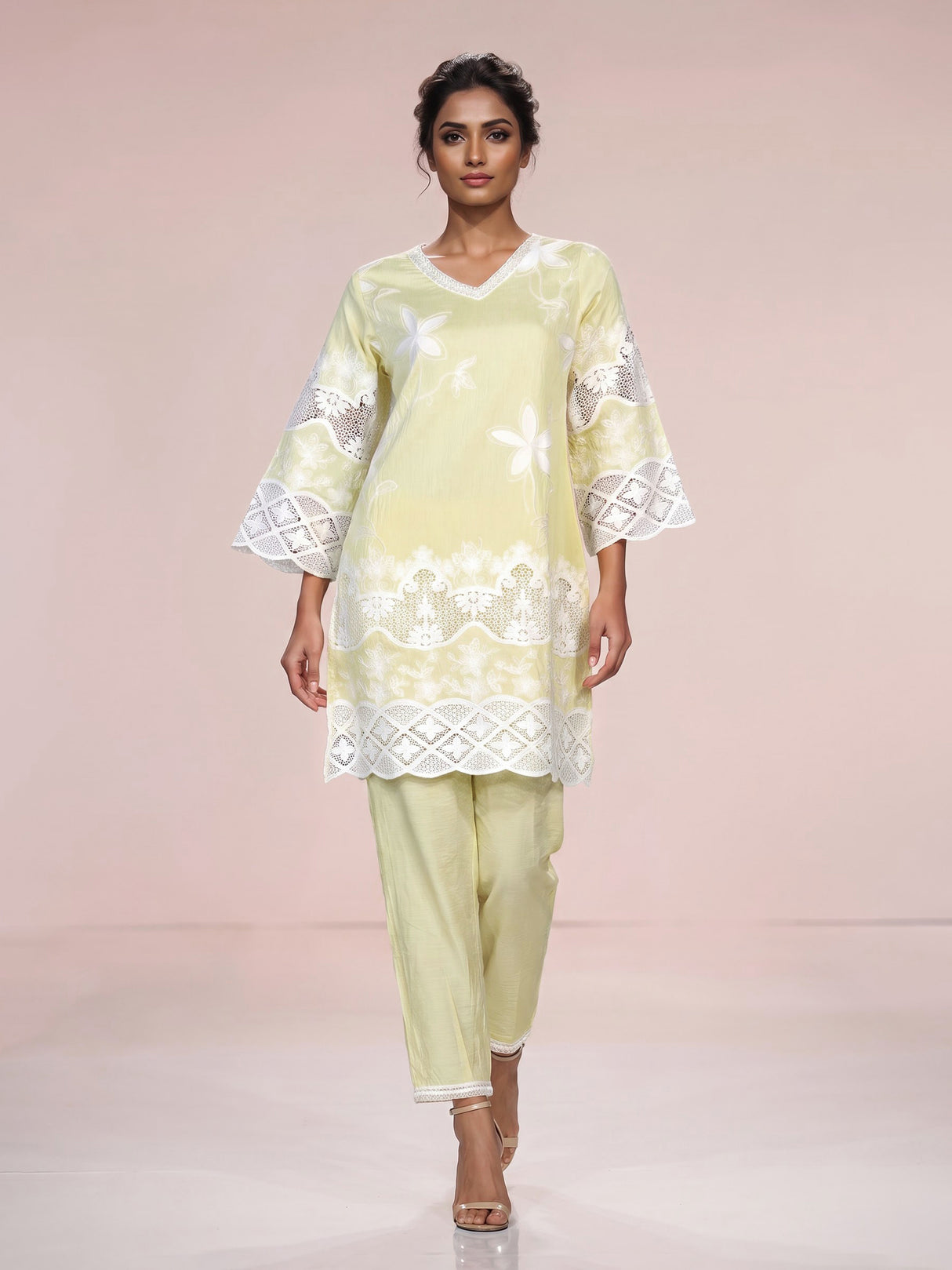 Radiant yellow cotton blend kurti set with pearls and cutwork