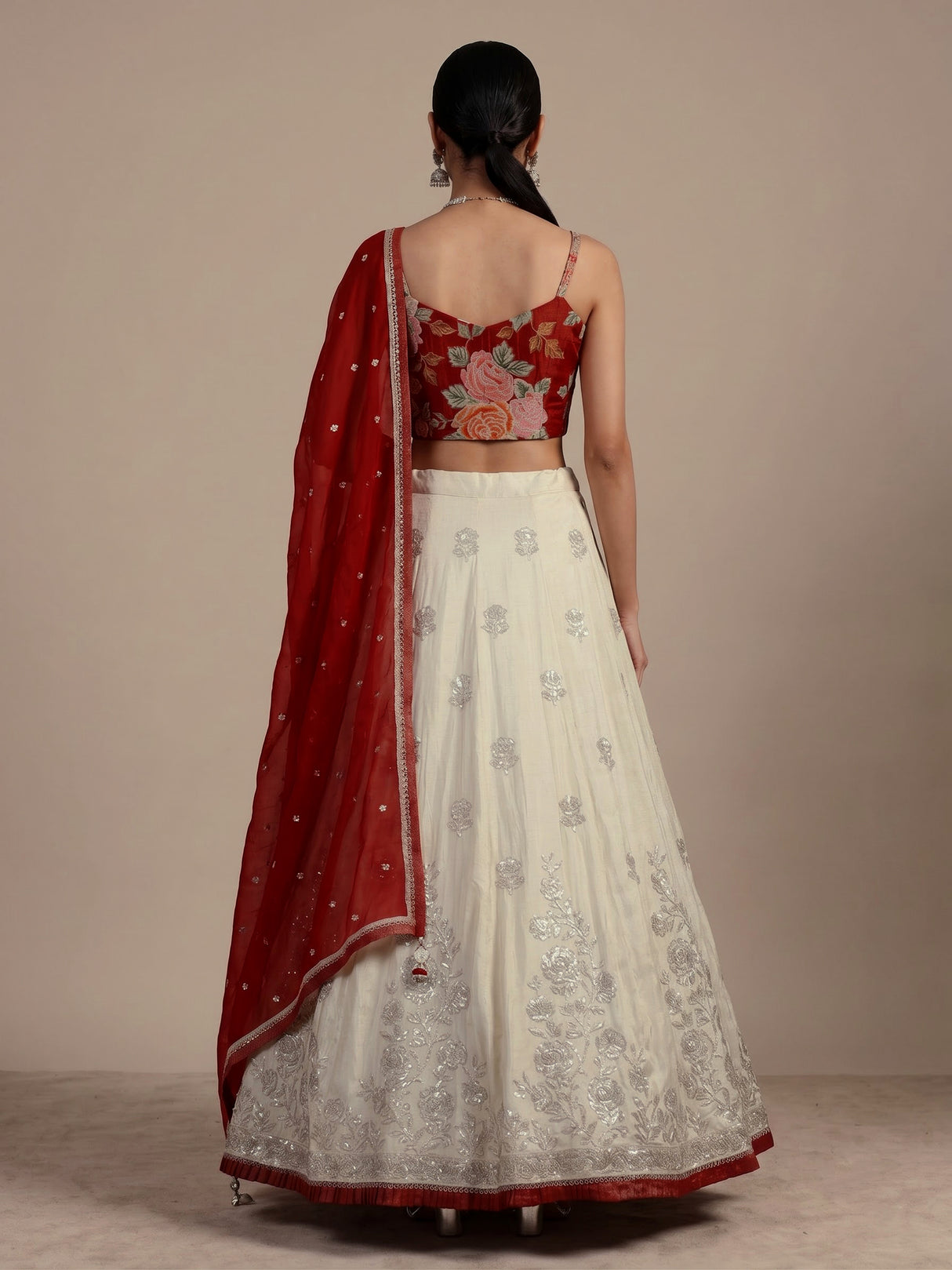 Stunning red silk lehenga choli with resham and diamond embellishments