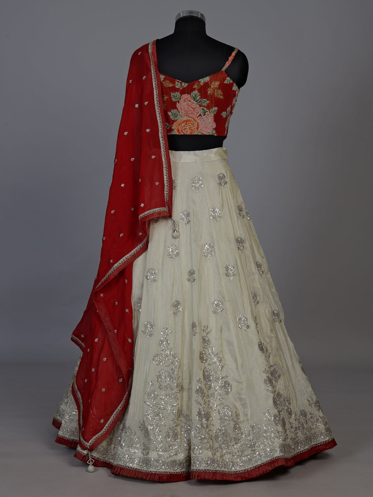 Stunning red silk lehenga choli with resham and diamond embellishments