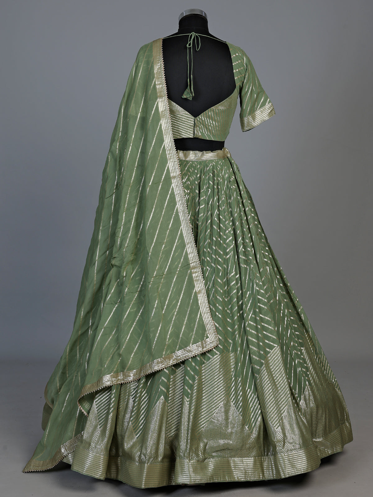 Pista green zari embellished women’s georgette lehenga choli