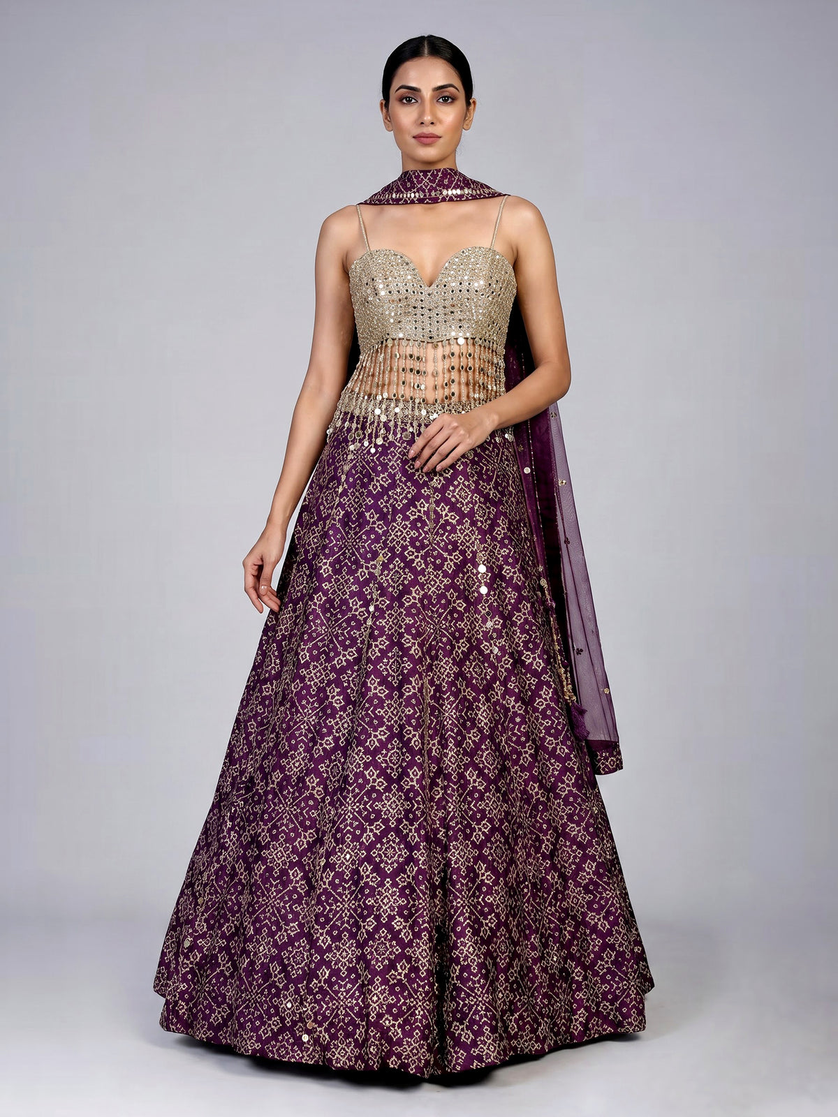 Purple bandhani mirror embellished women’s silk lehenga choli