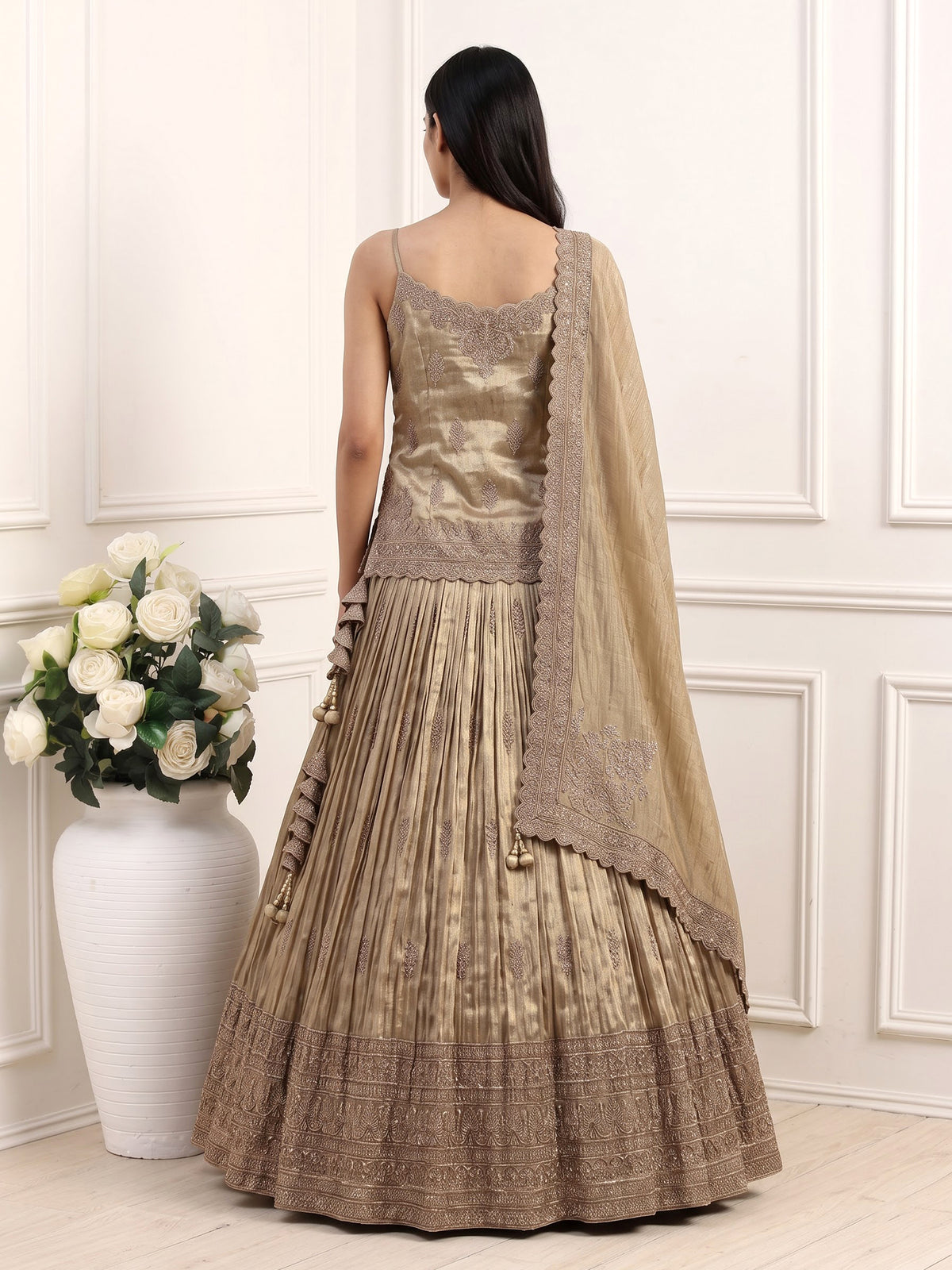 Golden zardosi embellished women’s shimmer silk lehenga choli