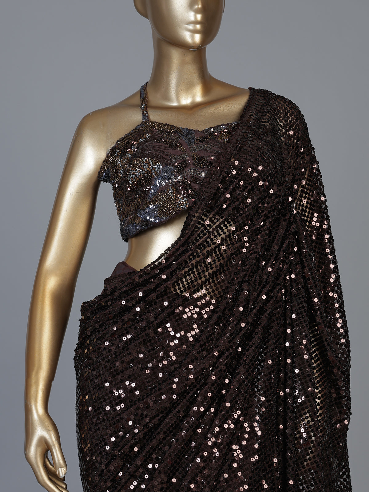 Brown net designer saree with tassel pallu and blouse