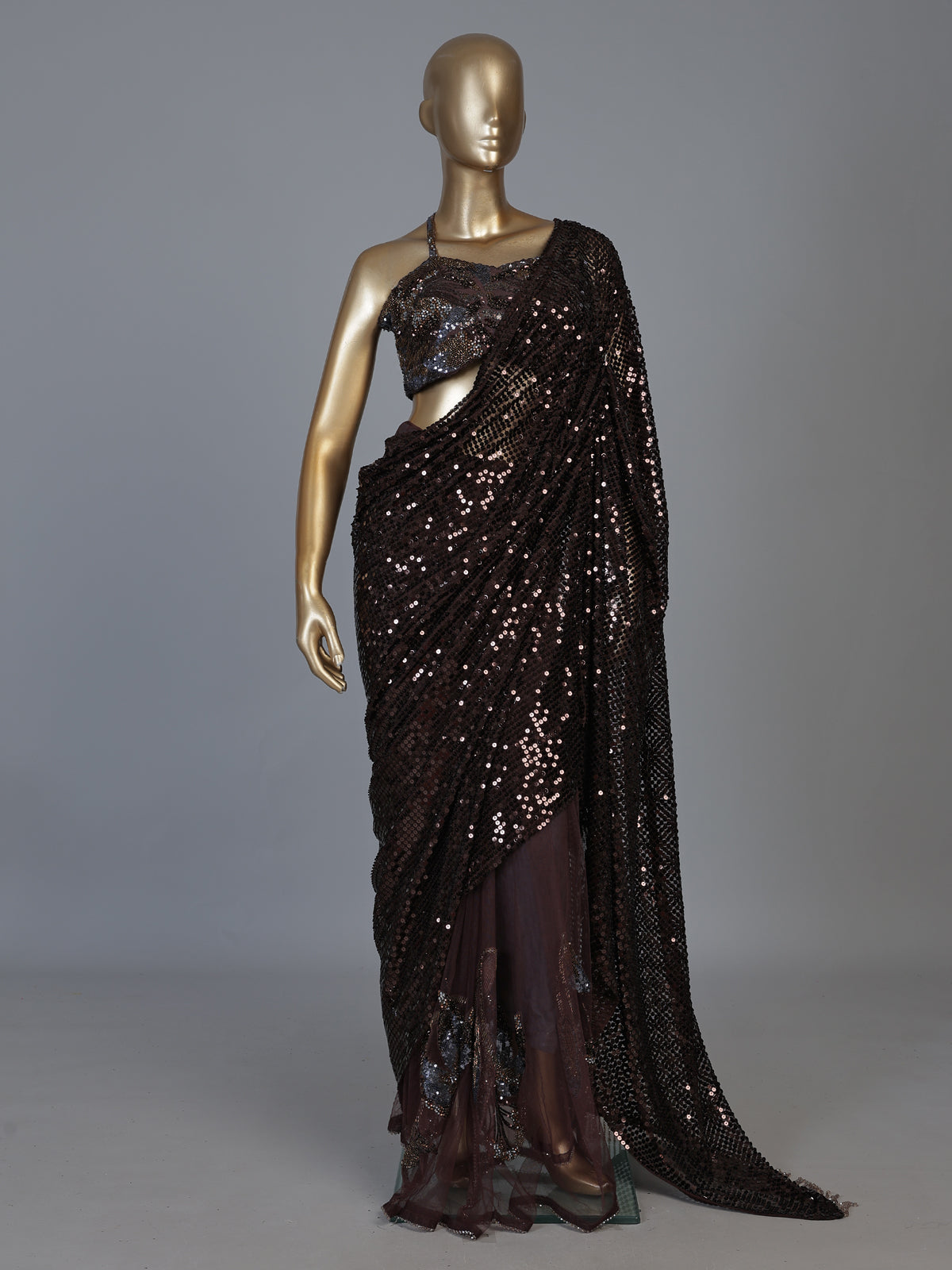 Brown net designer saree with tassel pallu and blouse