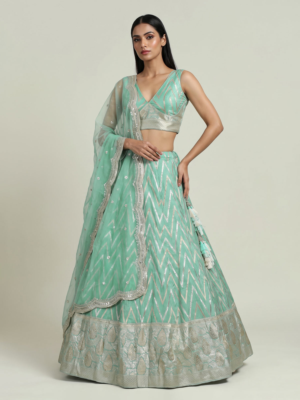 Mint green silk lehenga choli with embroidered sequin dupatta
