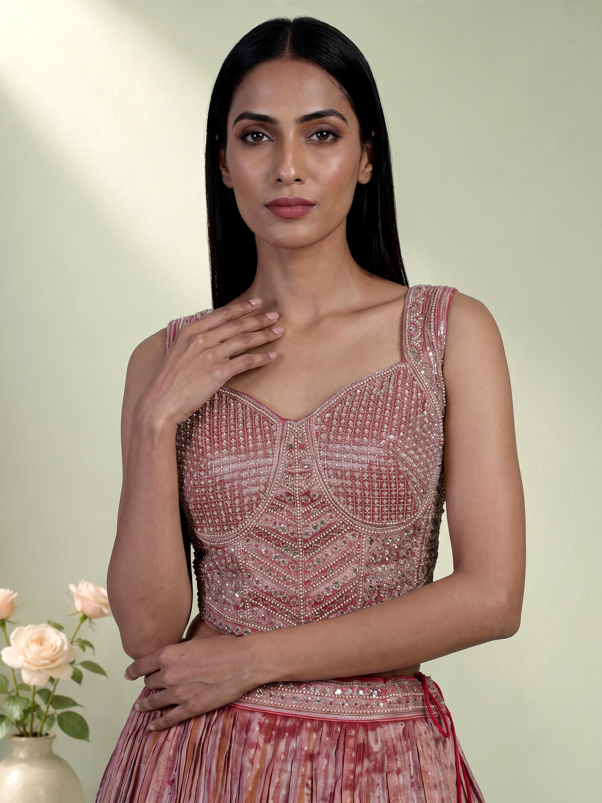 Pastel pink tissue silk lehenga choli with embellished dupatta