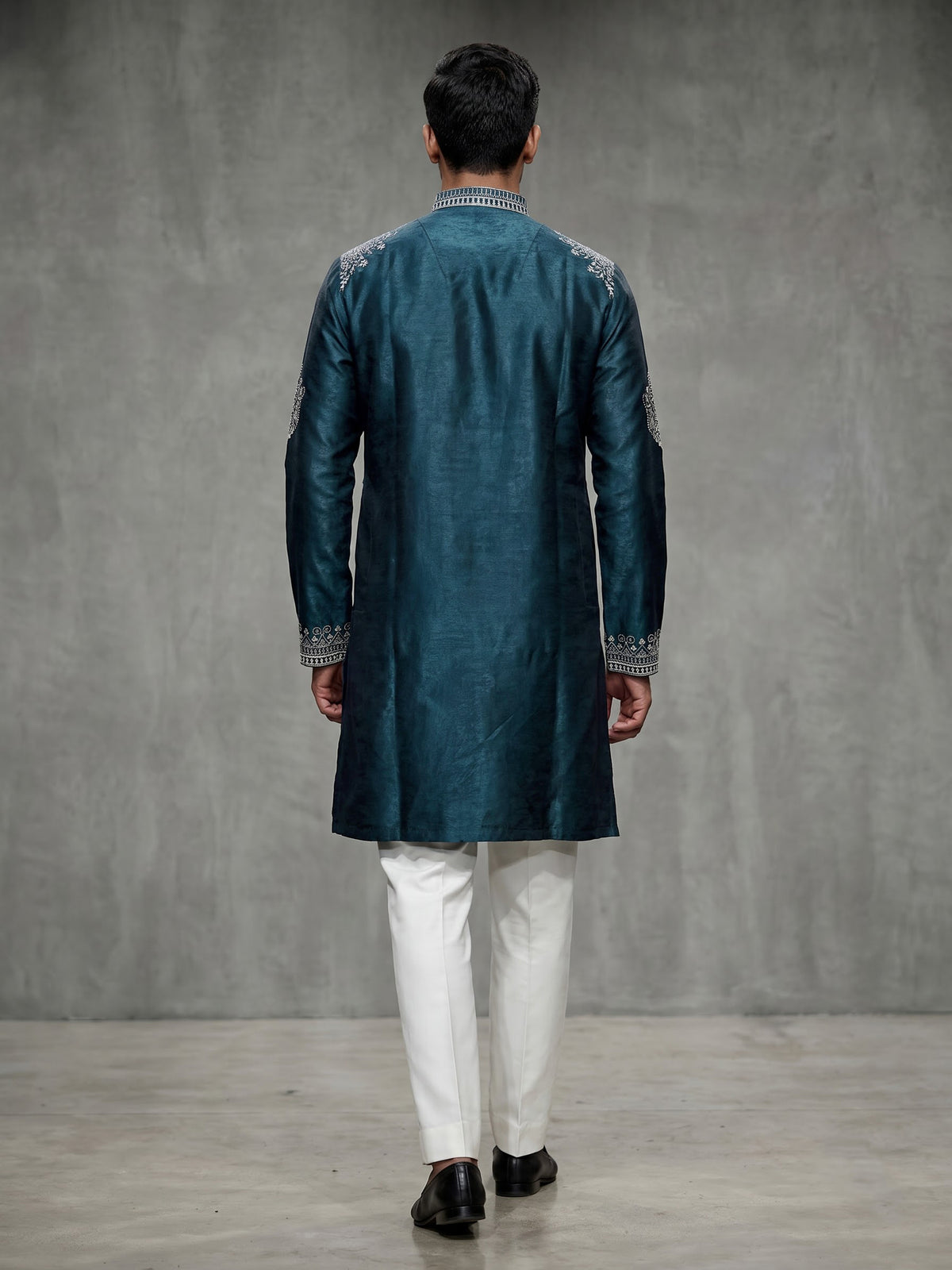 Teal blue silk kurta suit for men with elegant embroidery