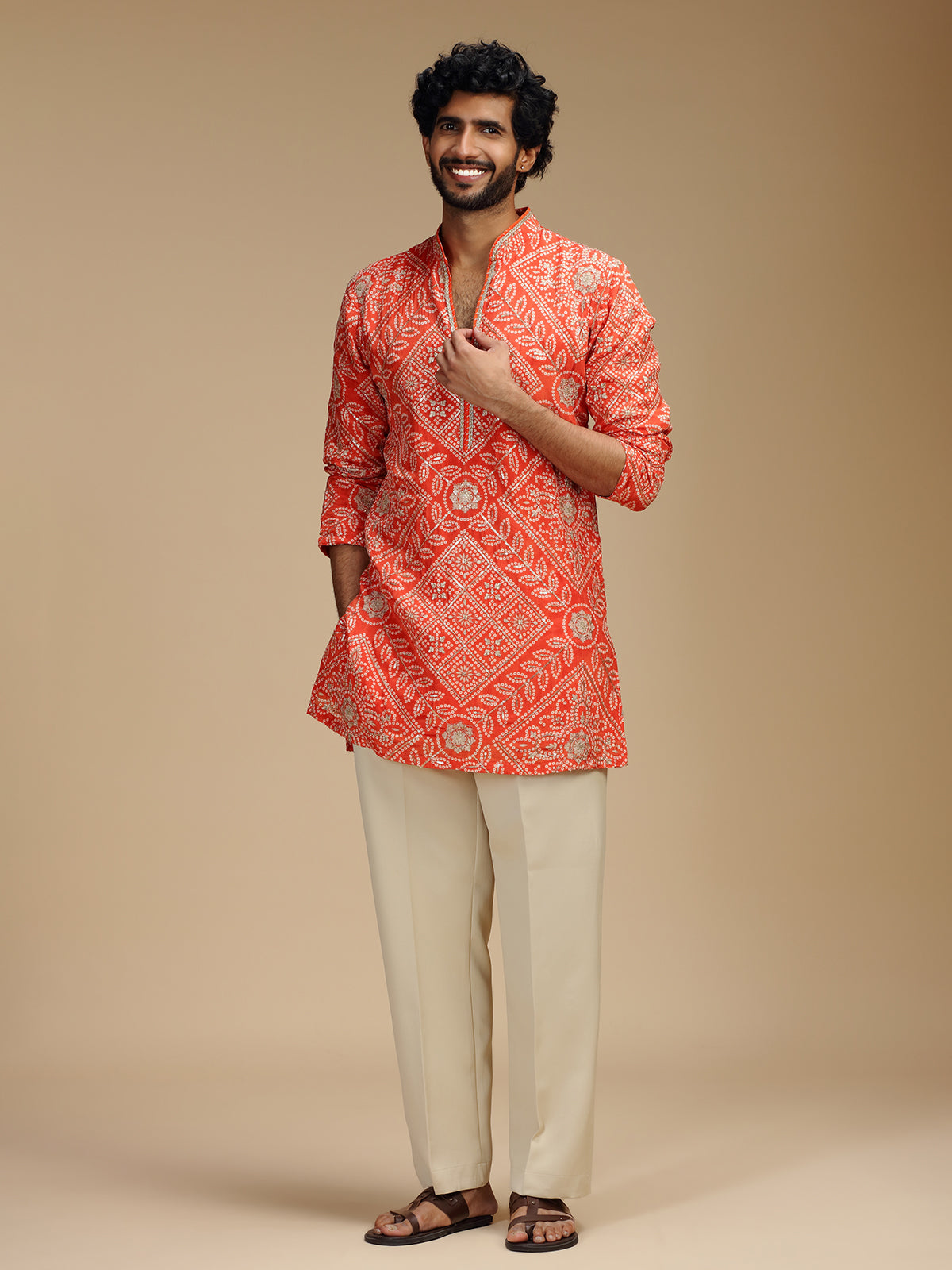 Orange pure crepe mens kurta suit with bandhani design