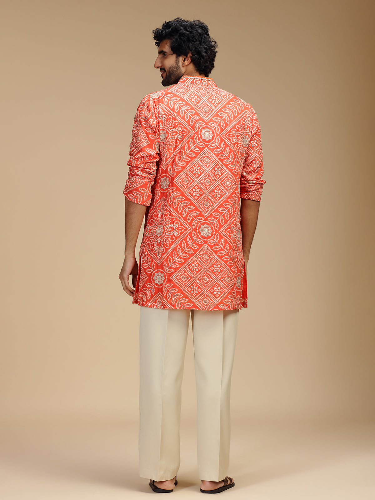 Orange pure crepe mens kurta suit with bandhani design
