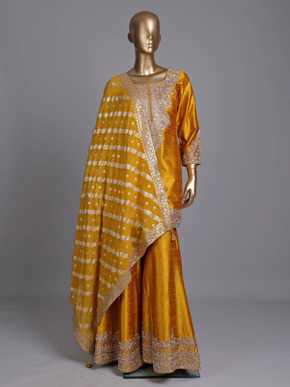 Mustard yellow raw silk punjabi suit with zari dupatta detailing