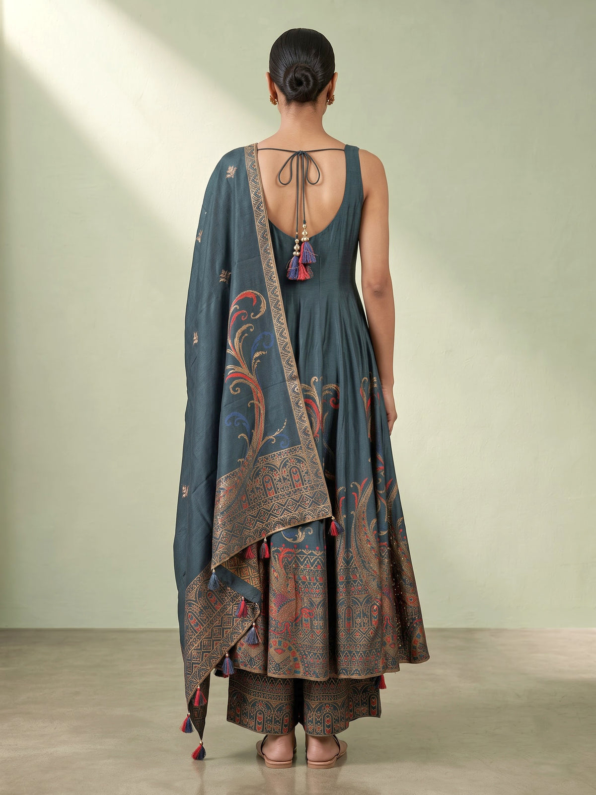 Peacock green silk anarkali suit with embellished dupatta