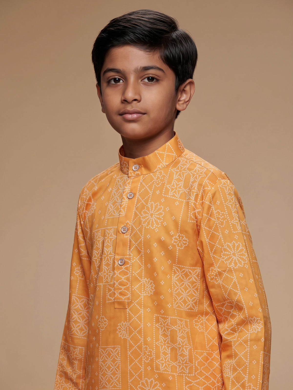 Light orange boys linen kurta suit with bandhani print