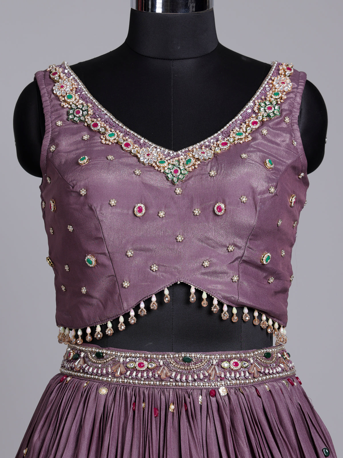 Purple silk wedding lehenga choli with dazzling diamond embellishments