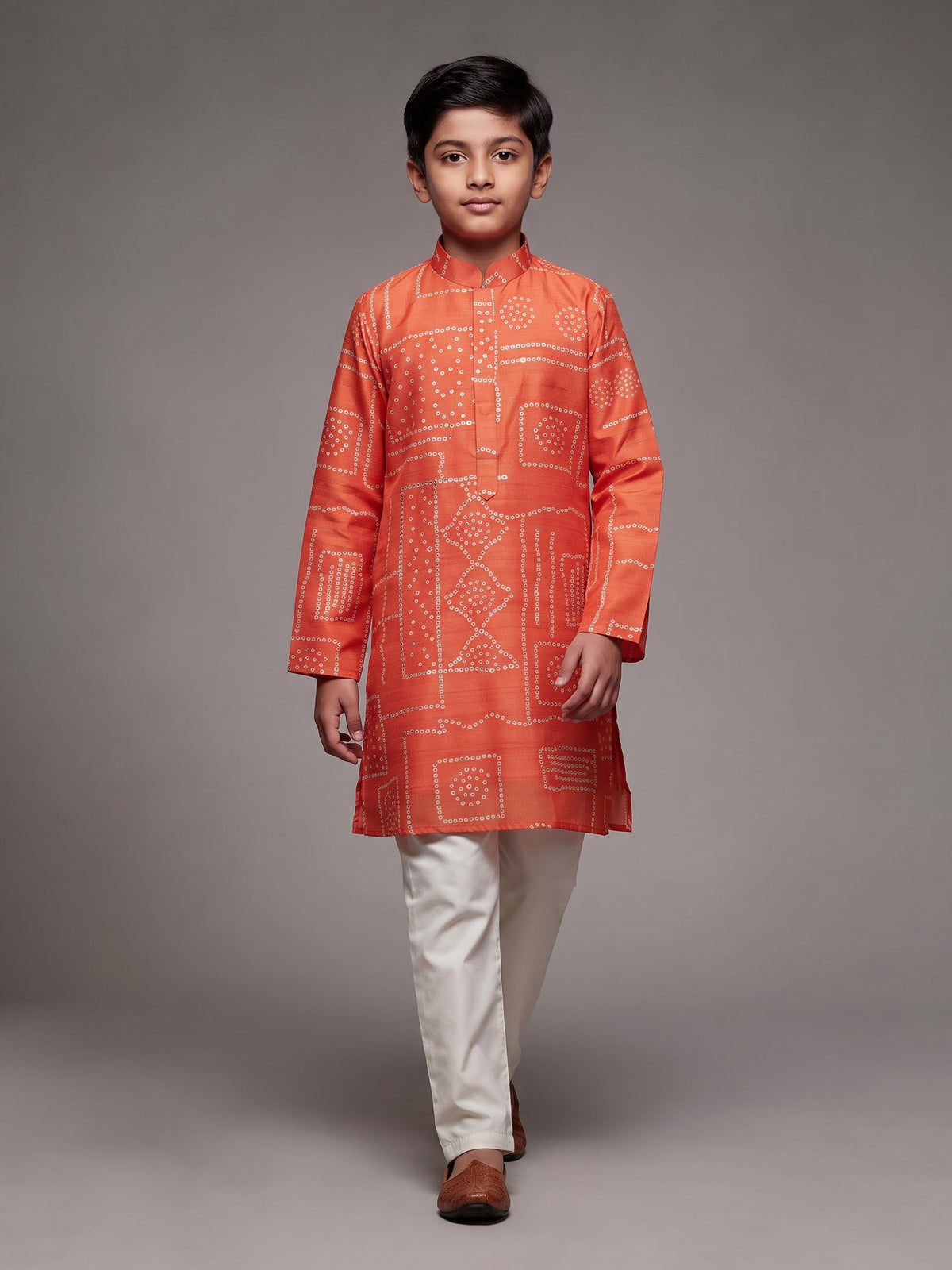 Orange boys raw silk kurta suit with traditional bandhani print