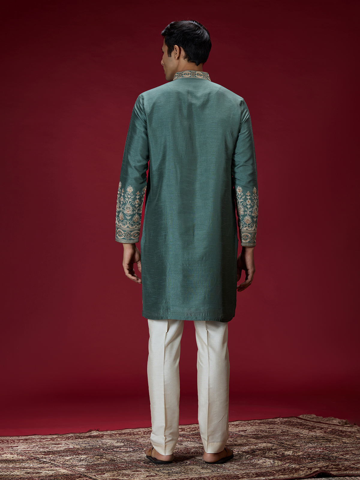 Green ornate embroidered mens kurta suit