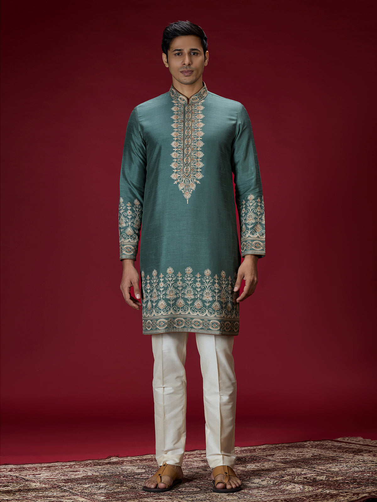 Green ornate embroidered mens kurta suit