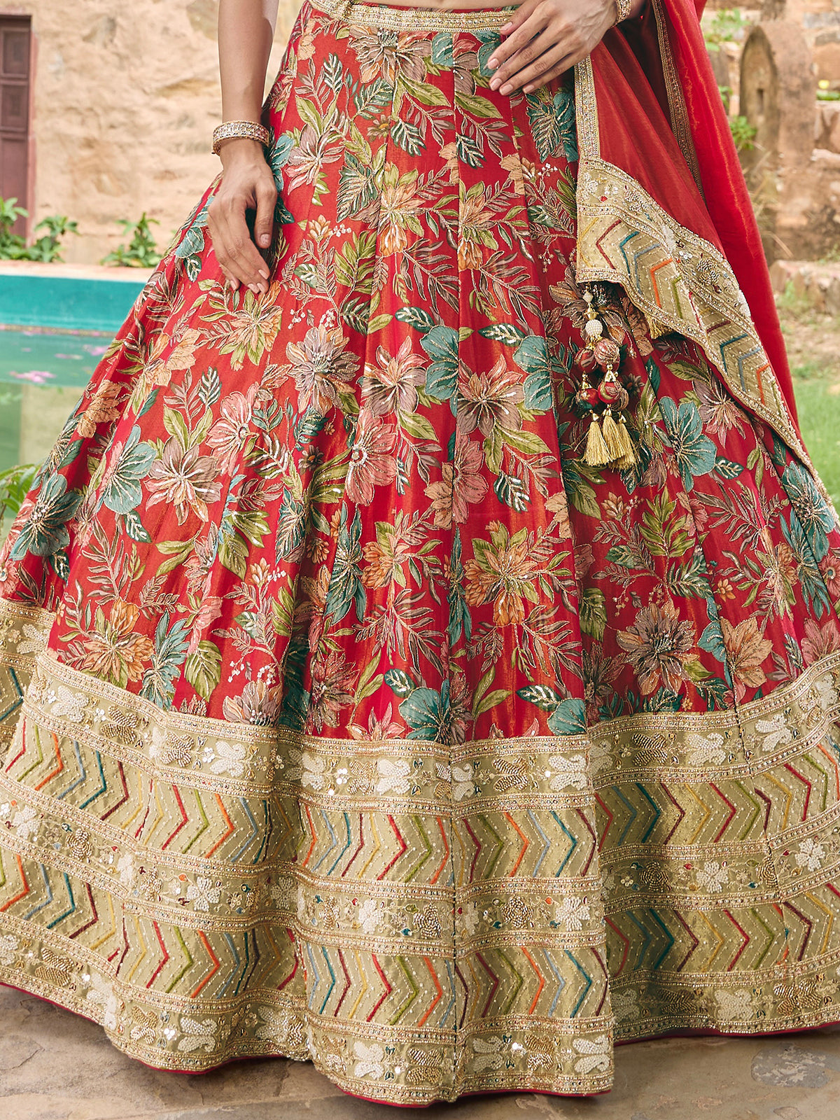 Red silk lehenga choli with floral embroidery and dupatta