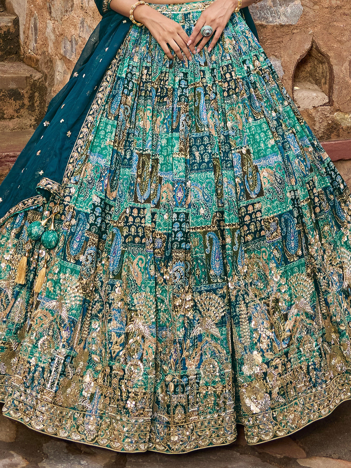 Peacock green silk lehenga choli with dupatta and embellishments