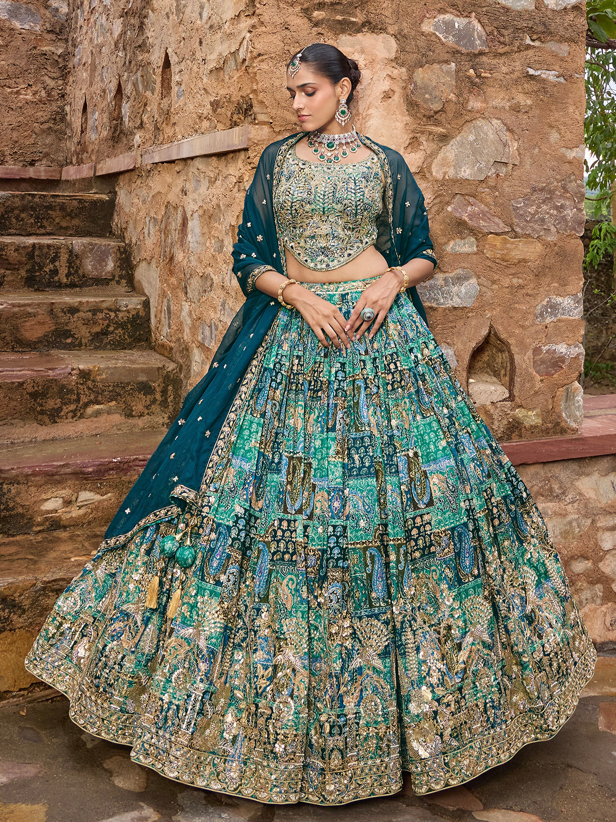 Peacock green silk lehenga choli with dupatta and embellishments