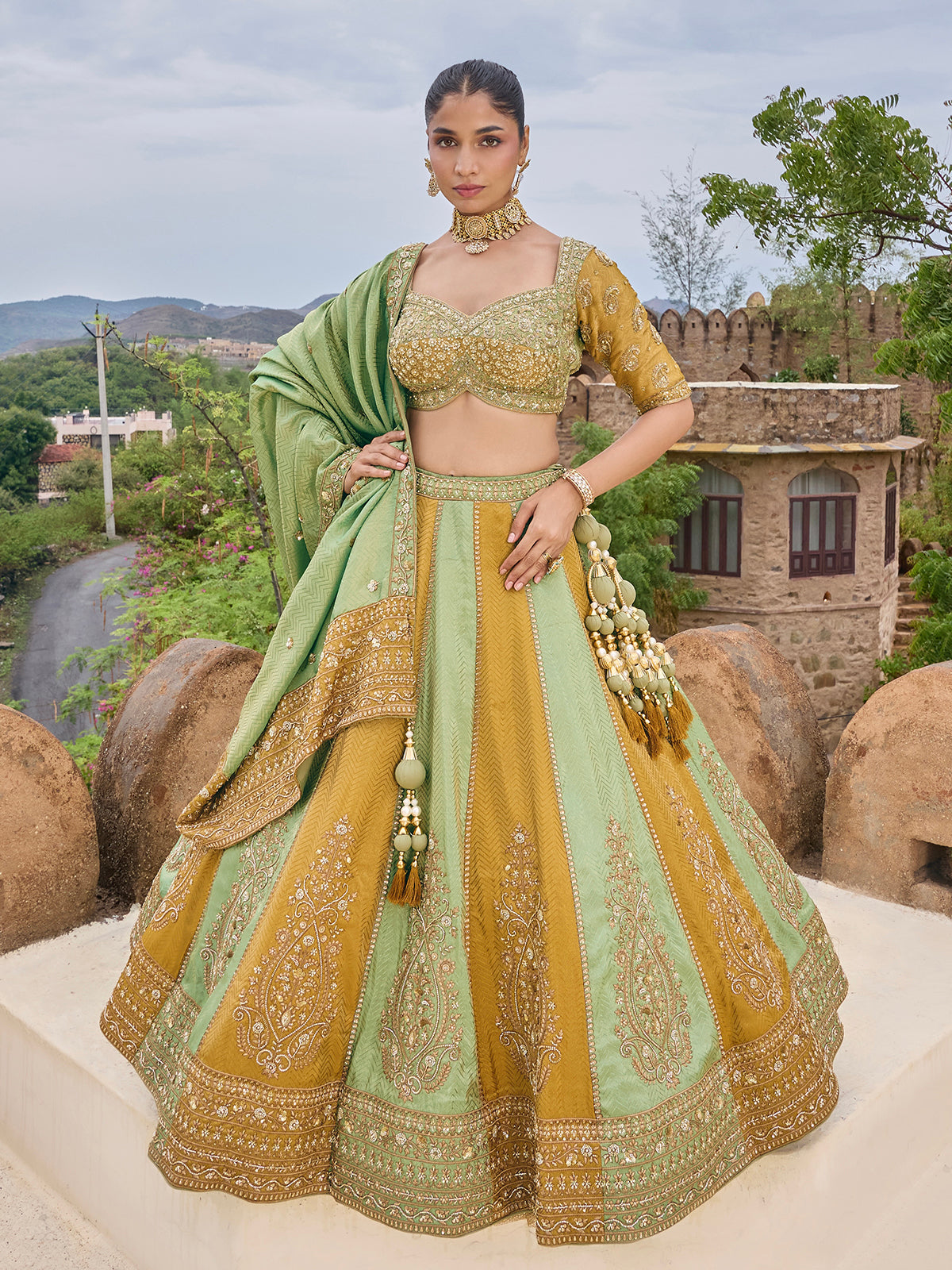 Mint green and gold silk lehenga choli with zig zag texture
