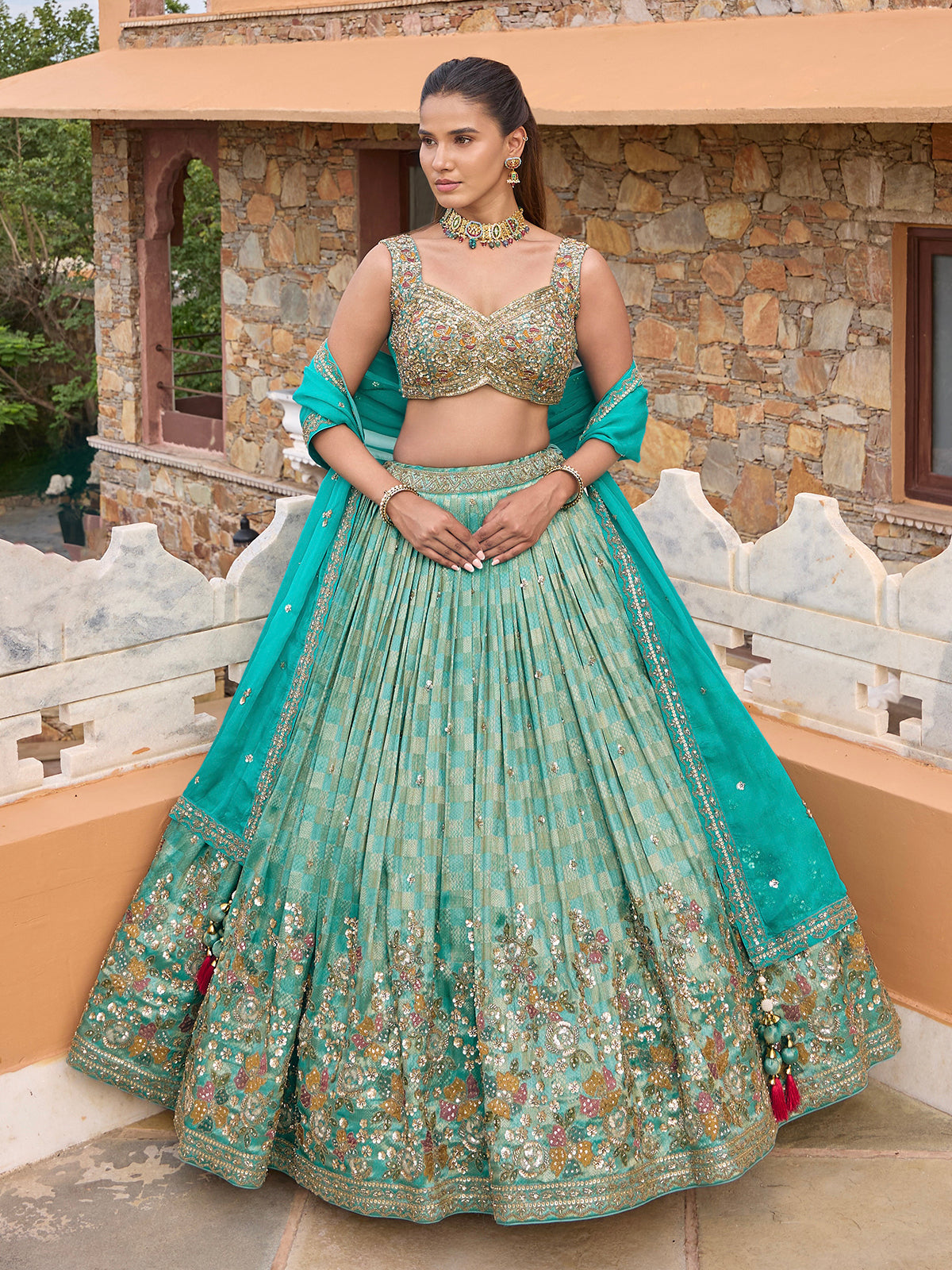 Aqua silk lehenga choli with checks texture and embellished dupatta