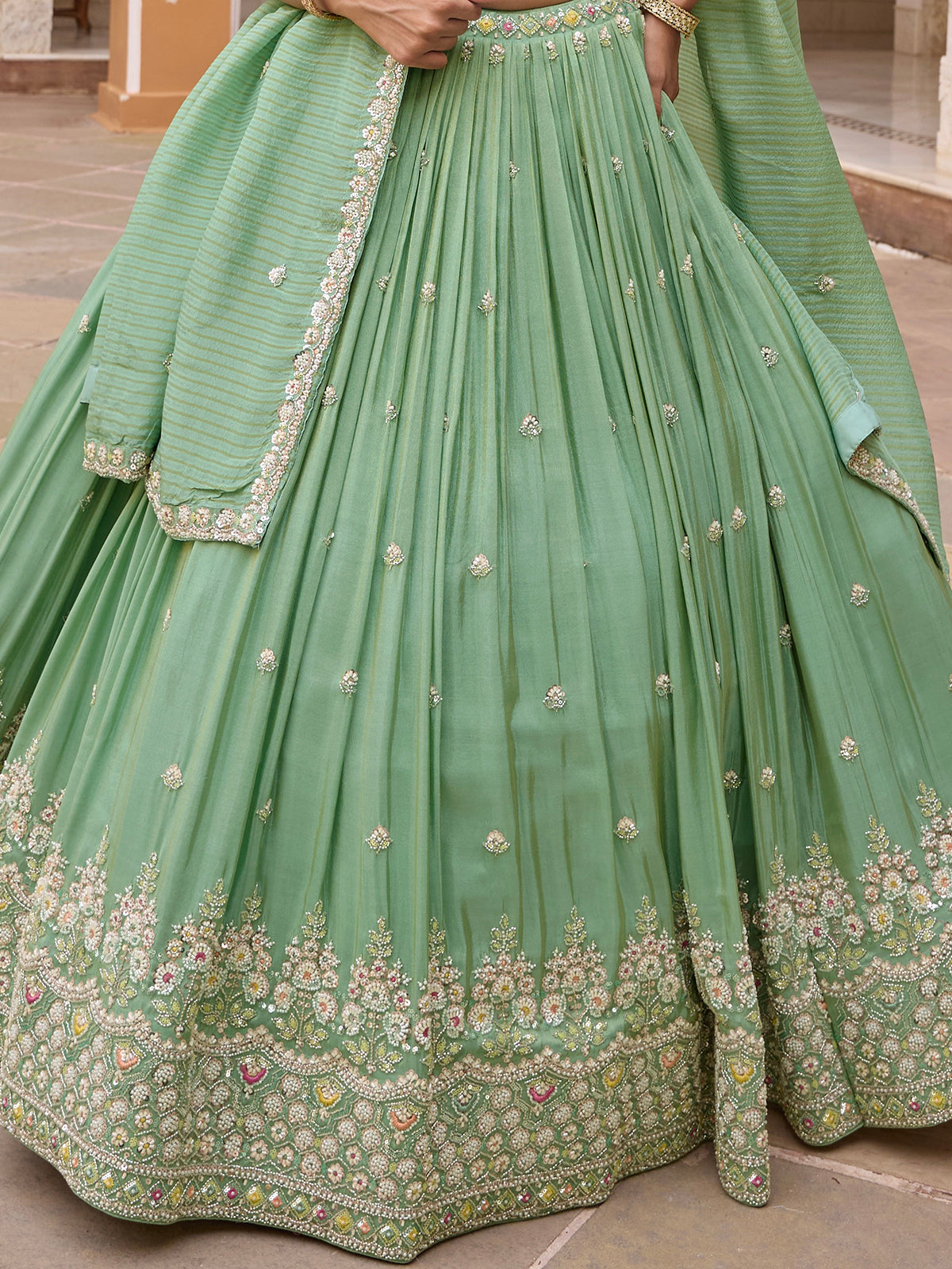 Pista green silk lehenga choli with embellished festive dupatta