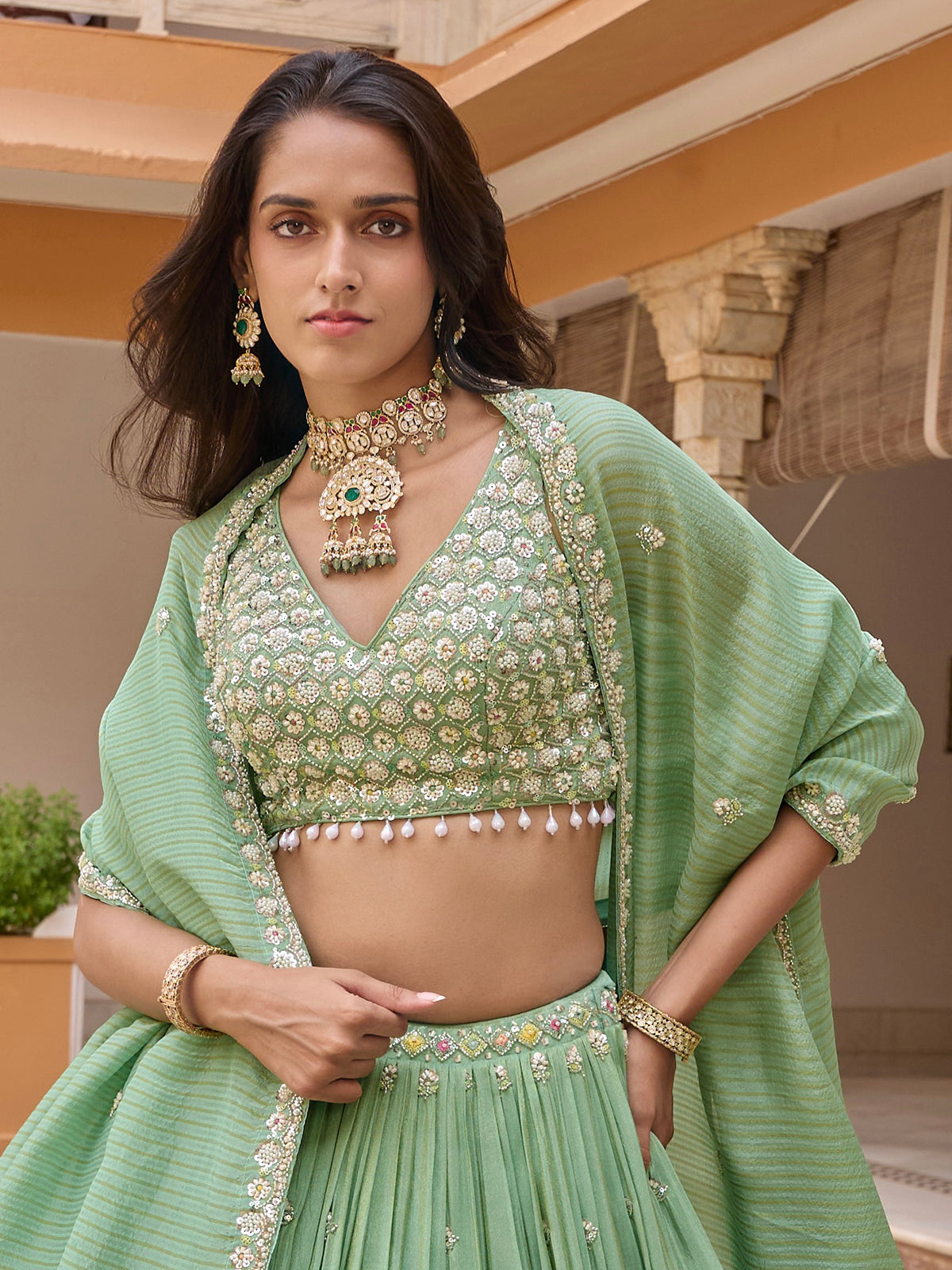 Pista green silk lehenga choli with embellished festive dupatta