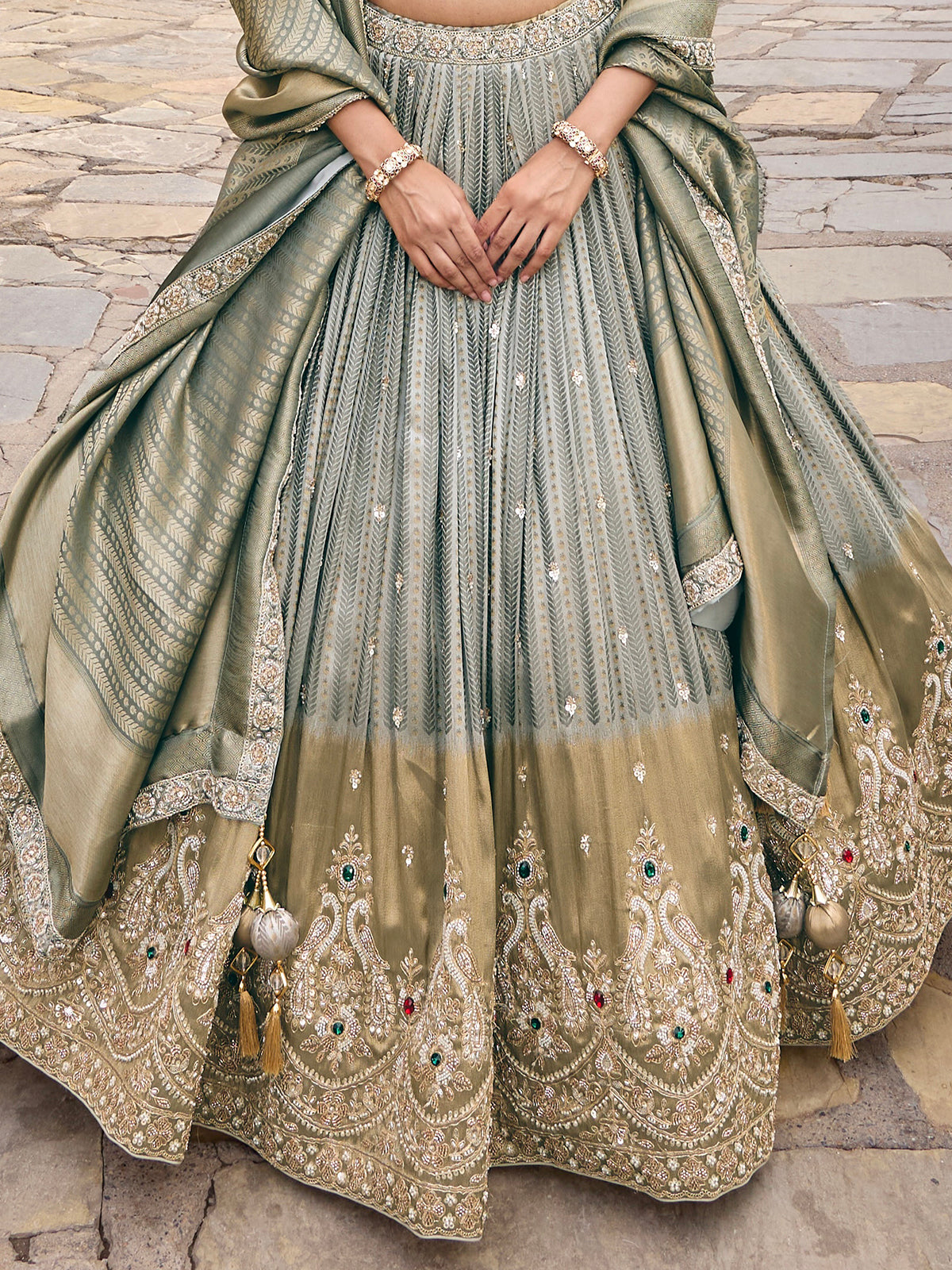Grey silk lehenga choli with peacock motifs and shaded dupatta