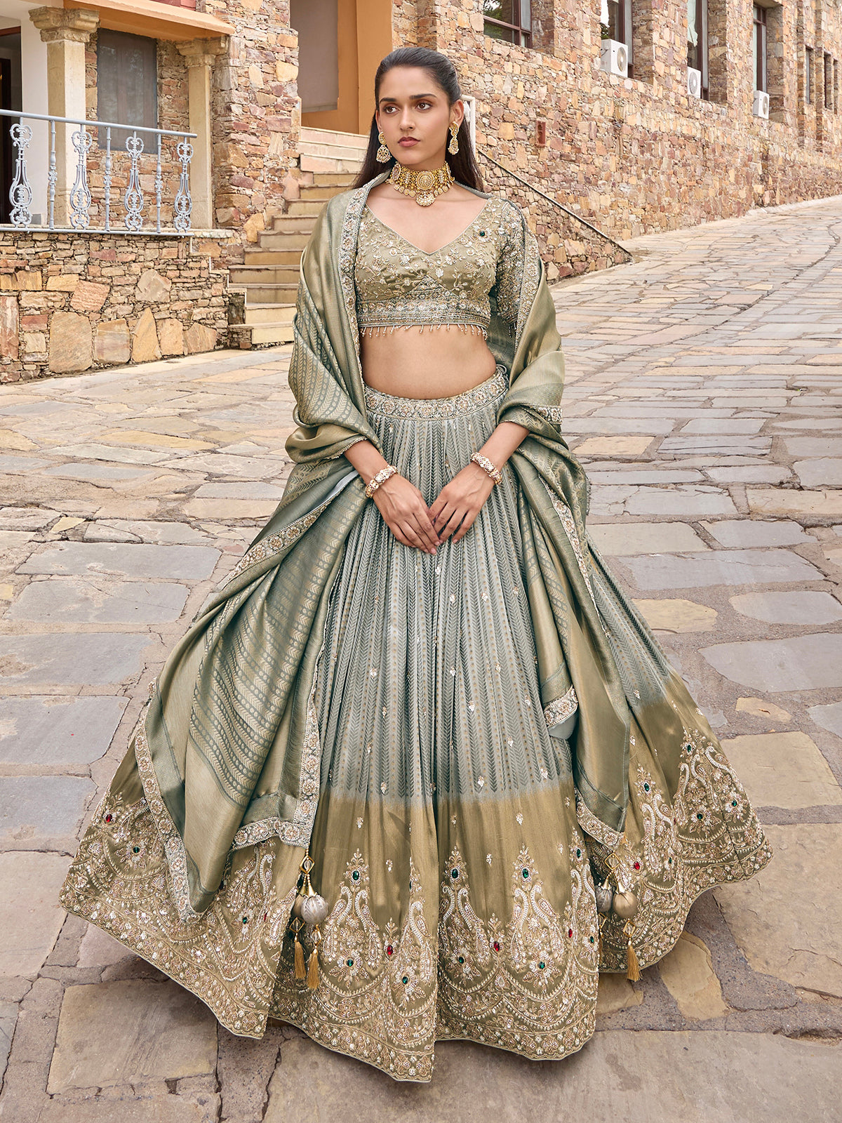 Grey silk lehenga choli with peacock motifs and shaded dupatta