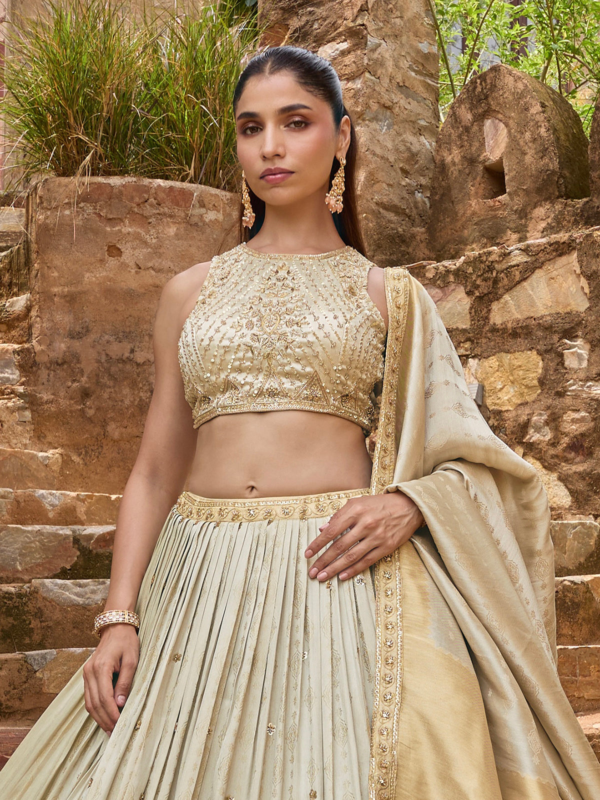 Cream silk lehenga choli with designer shaded embellished dupatta