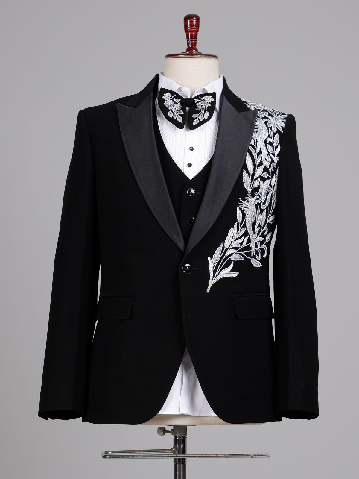 Black terry rayon tuxedo suit with floral cutdana embroidery