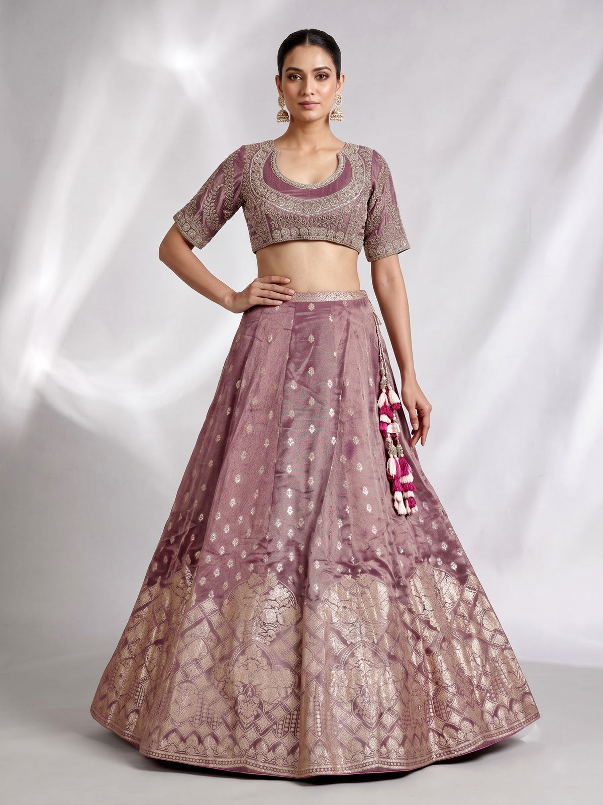Purple banarasi silk lehenga choli with zari and mirror embellishments