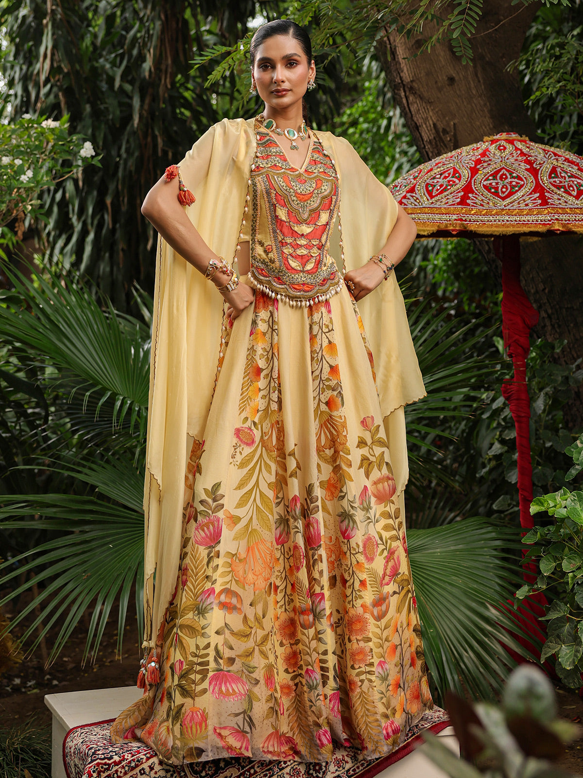 Elegant floral lehenga choli with heavy designer cape jacket