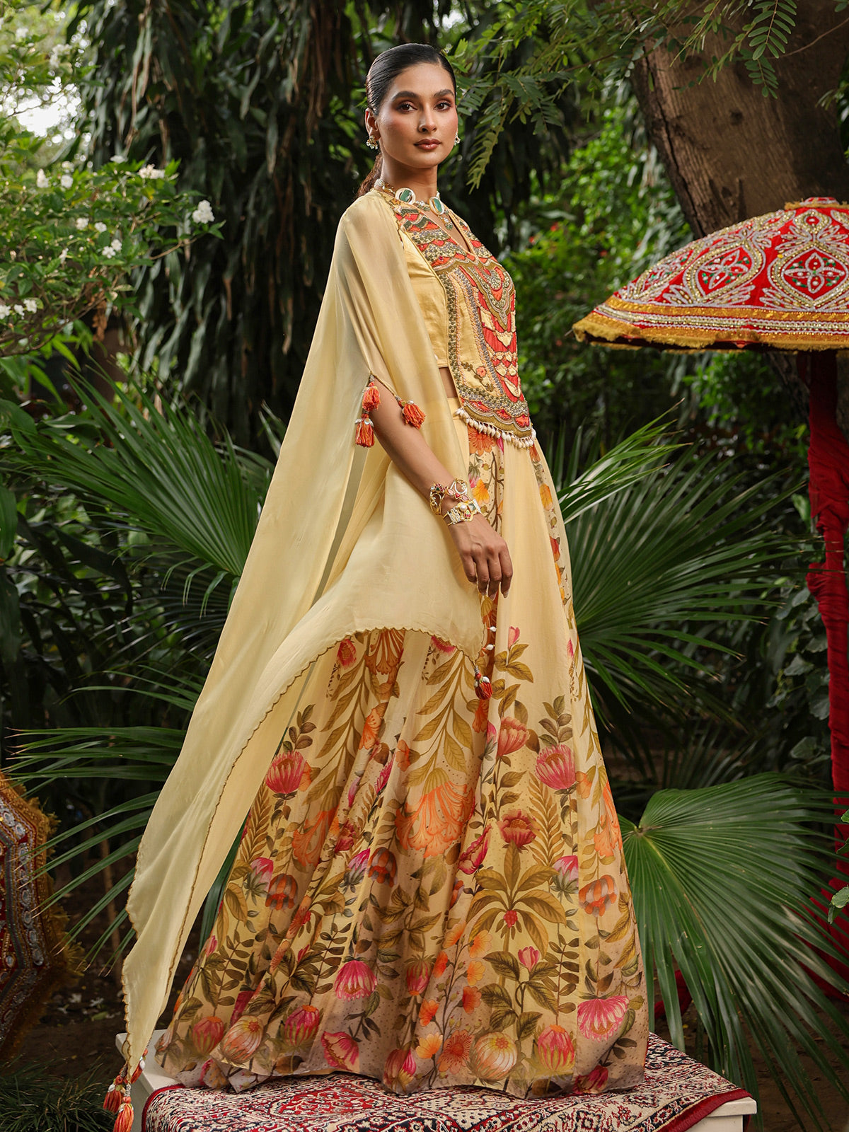 Elegant floral lehenga choli with heavy designer cape jacket
