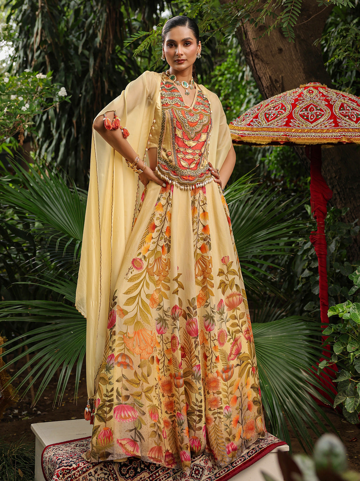Elegant floral lehenga choli with heavy designer cape jacket