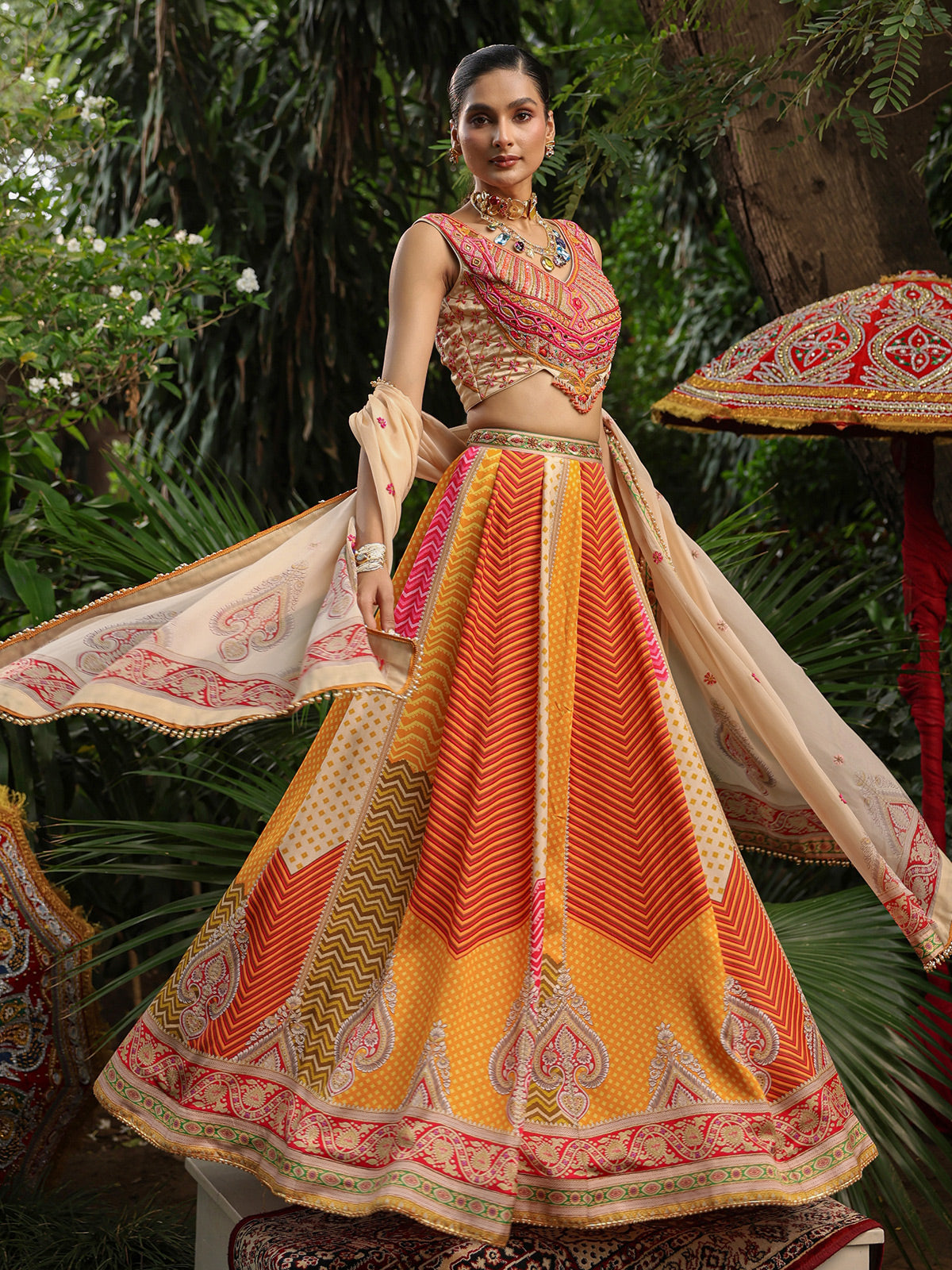 Multicolor geometric print lehenga choli with heavy embellished blouse