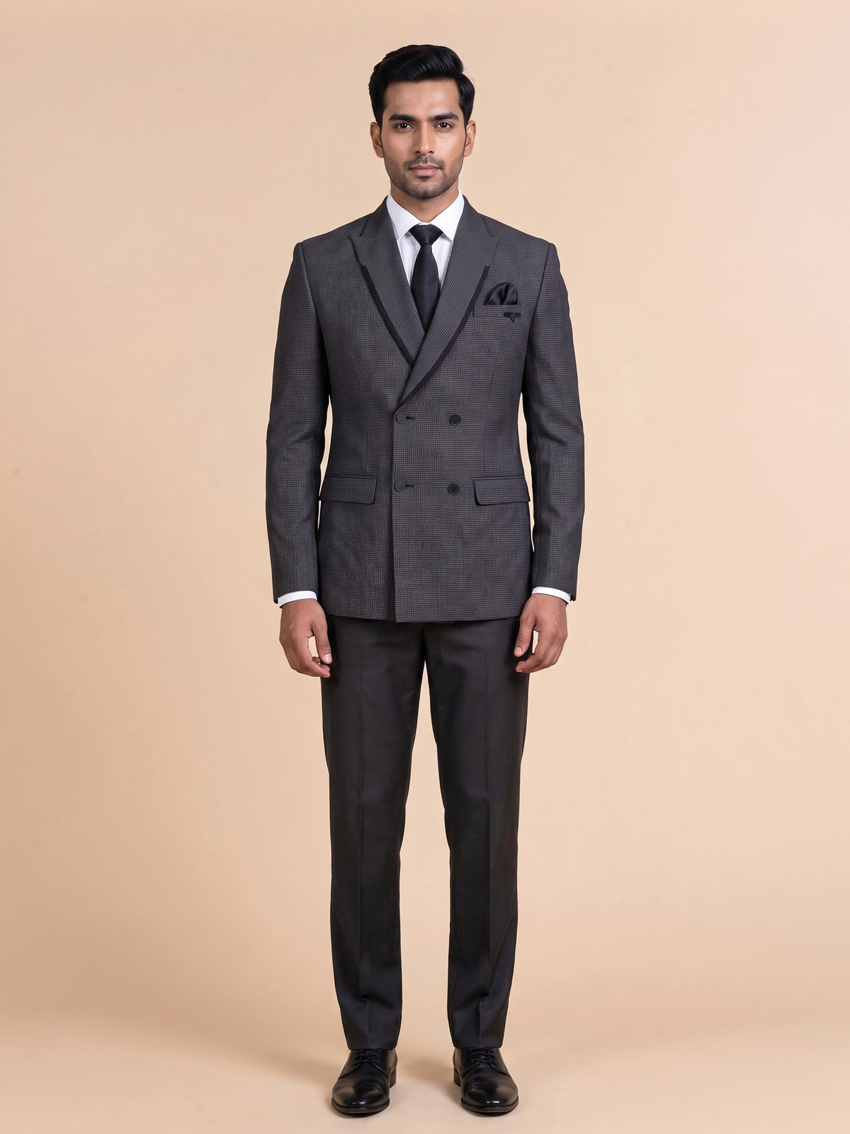 Charcoal grey double-breasted suit with black satin lapels