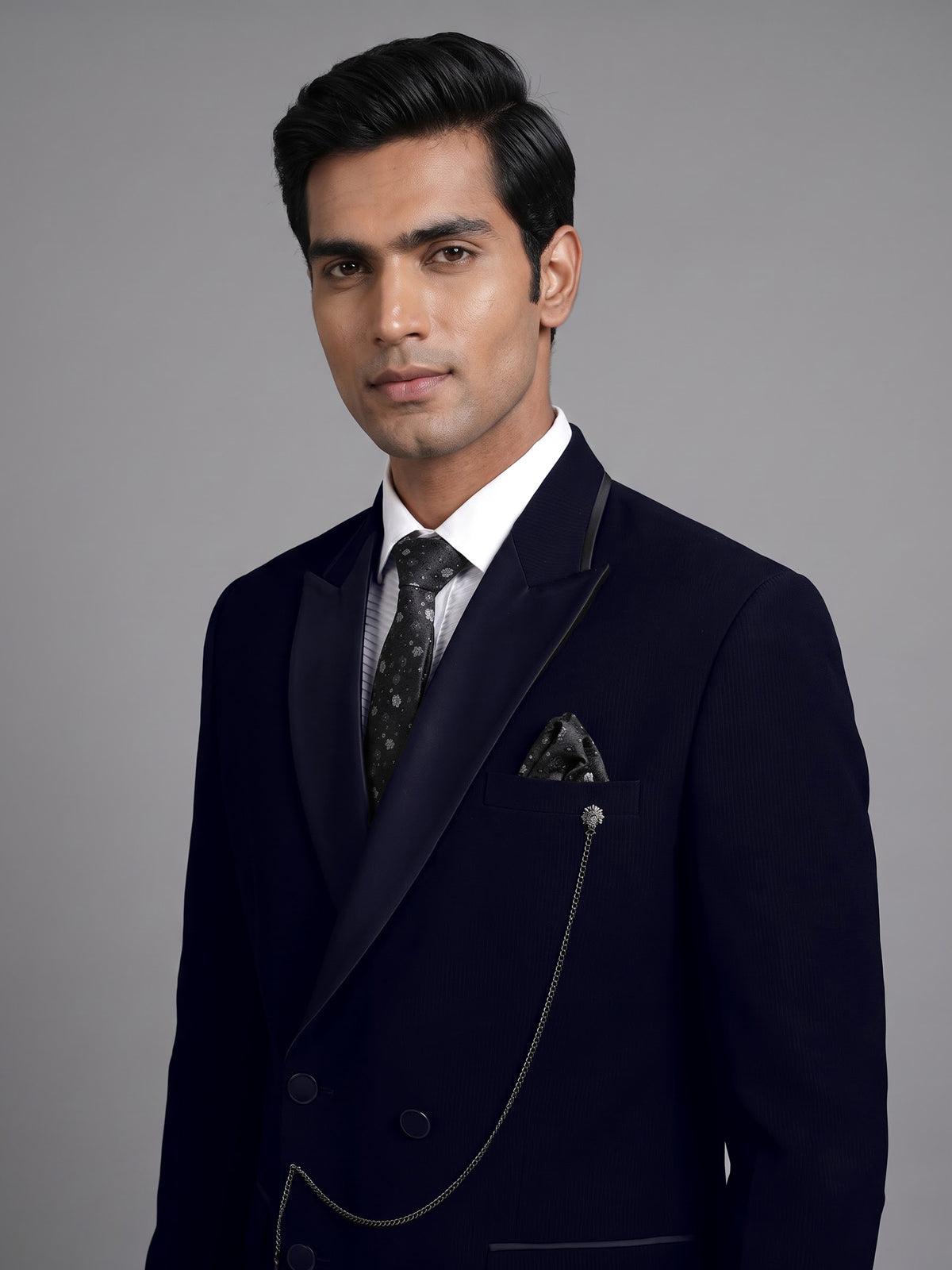 Black terry rayon double-breasted tuxedo suit with crystal brooch