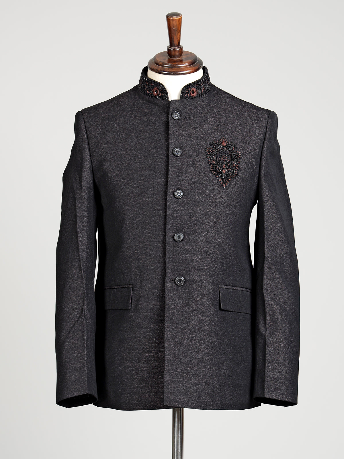 Jet black textured jodhpuri suit for mens with crest motif