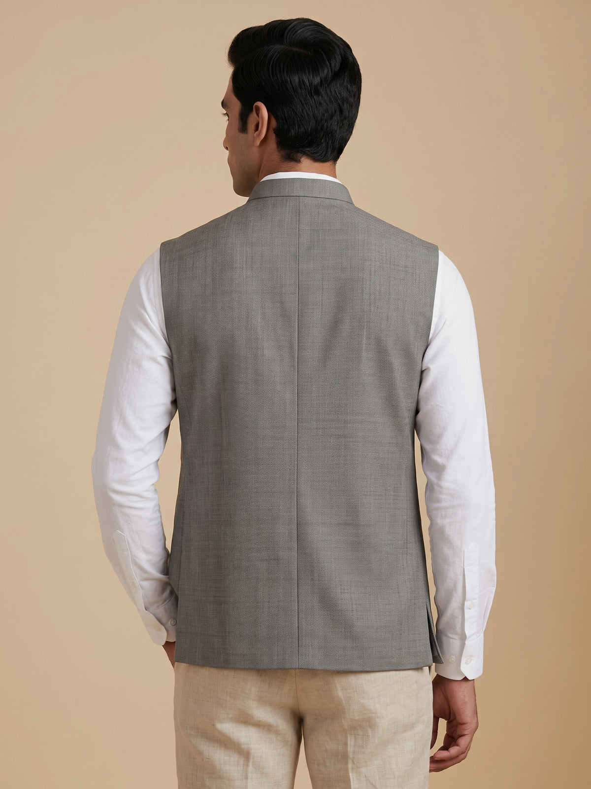 Grey textured zardosi waistcoat with safari pocket detailing for mens