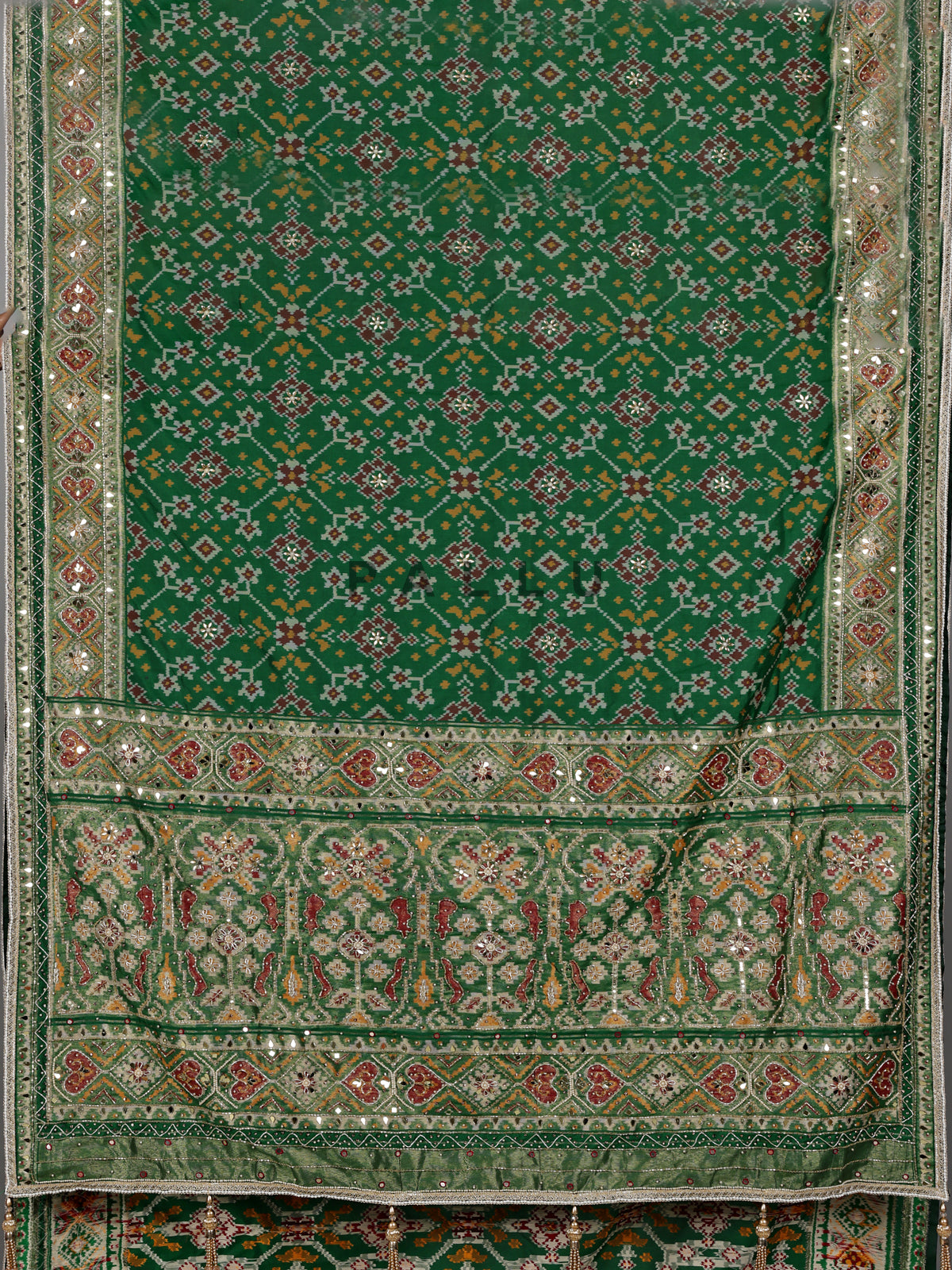 Emerald green semi silk Patola motif zardosi saree